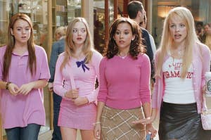 Cady Heron, Karen Smith, Gretchen Wieners, and Regina George walk together in a line in their town mall