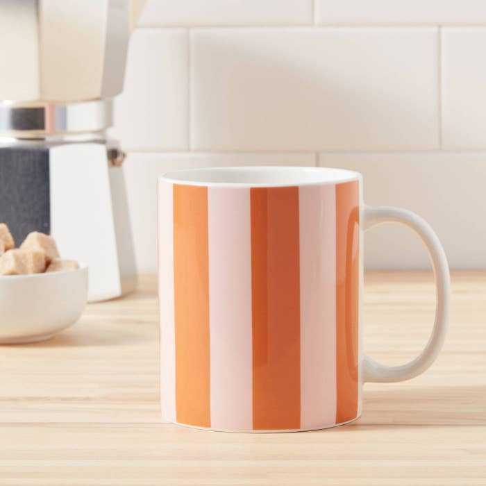 striped mug on table