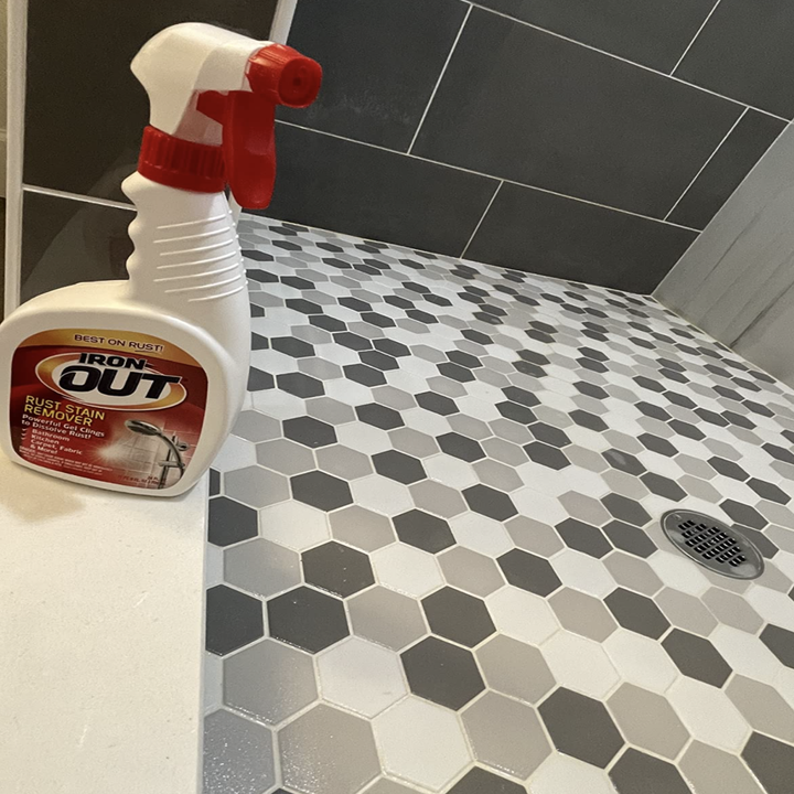 the same shower floor but now clear of the orange rust