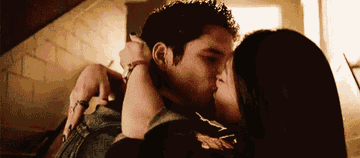 Scott and Kira kiss