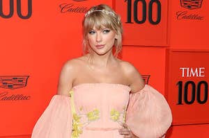 taylor swift in a dress with puffy sleeves