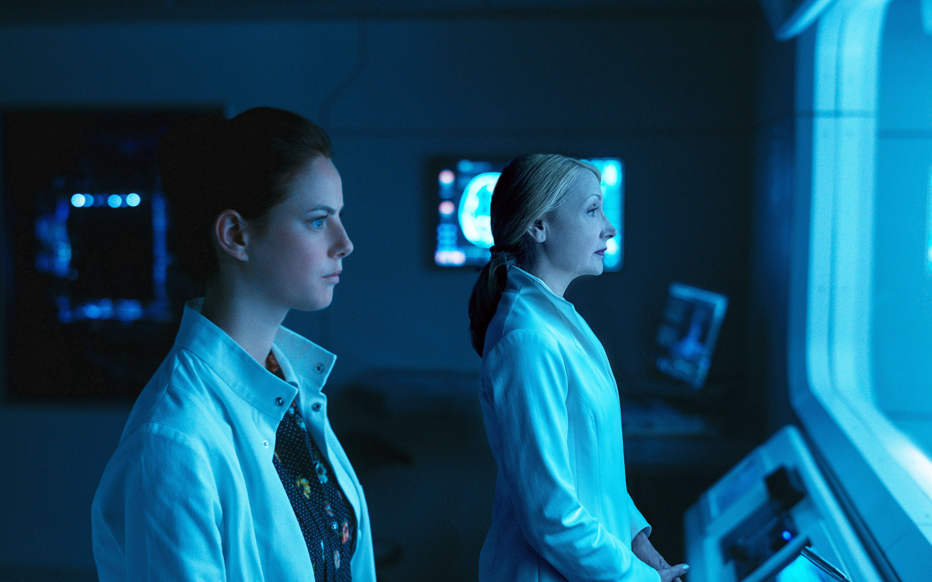 Teresa with Ava in a control room
