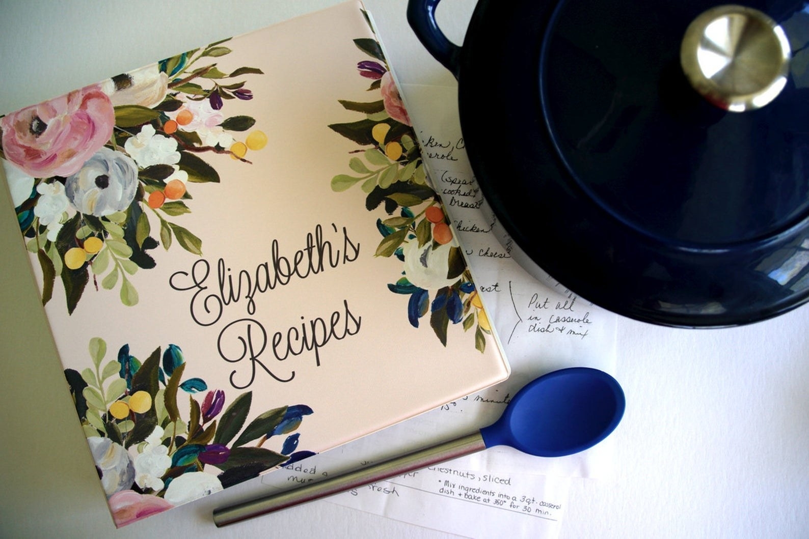 a floral recipe binder personalized with text that reads &quot;elizabeth&#x27;s recipes&quot;