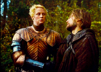 Brienne and Jaime in the woods looking at each other