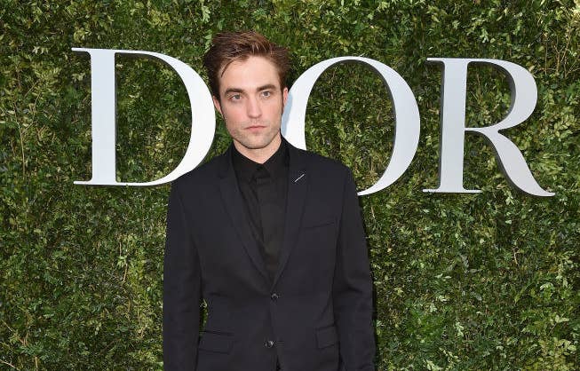 Robert Pattinson on the carpet for a Dior fashion show