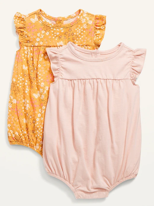 Two sleeveless baby rompers in a pile