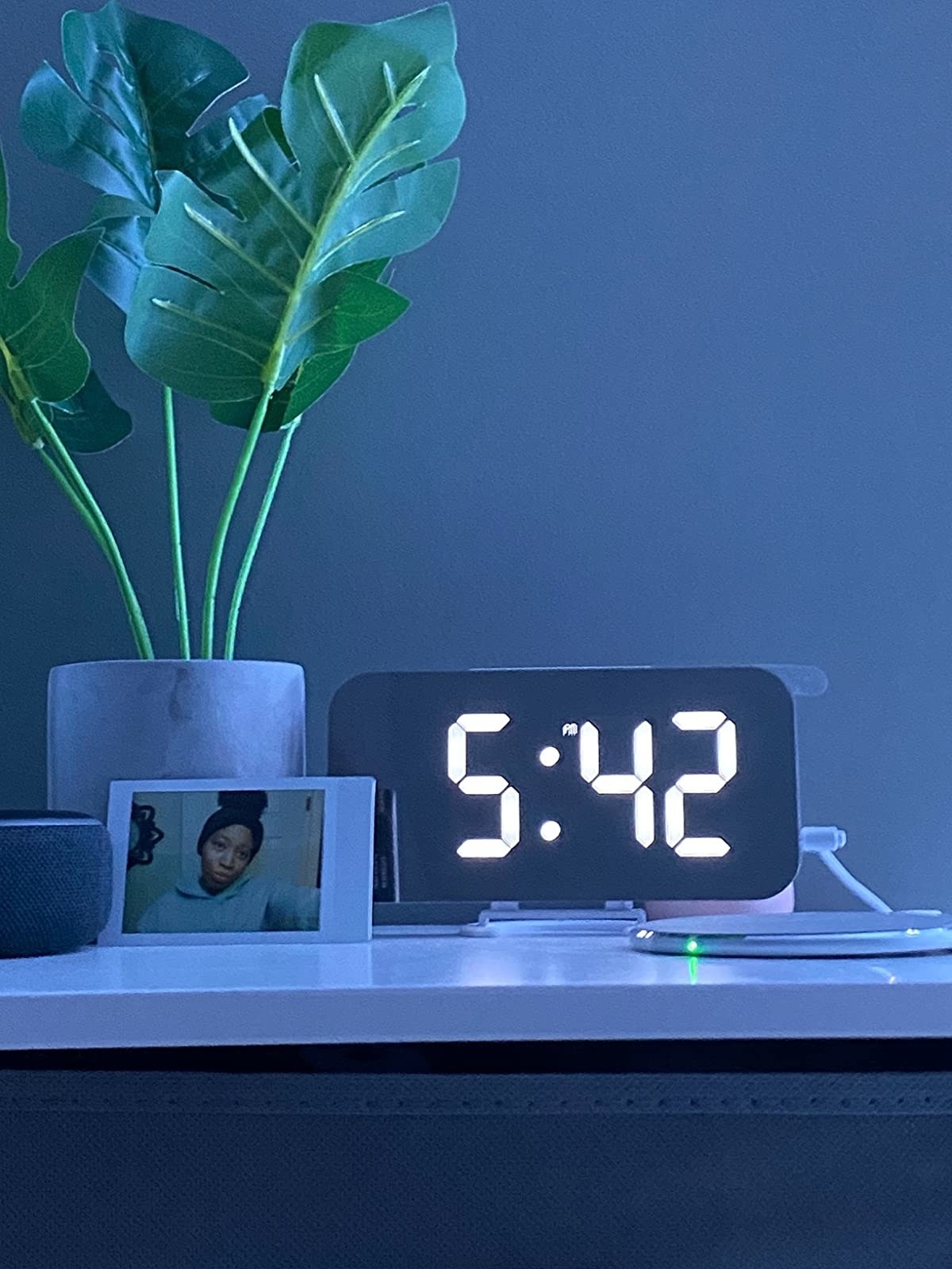 reviewer image of the digital clock on a bookshelf