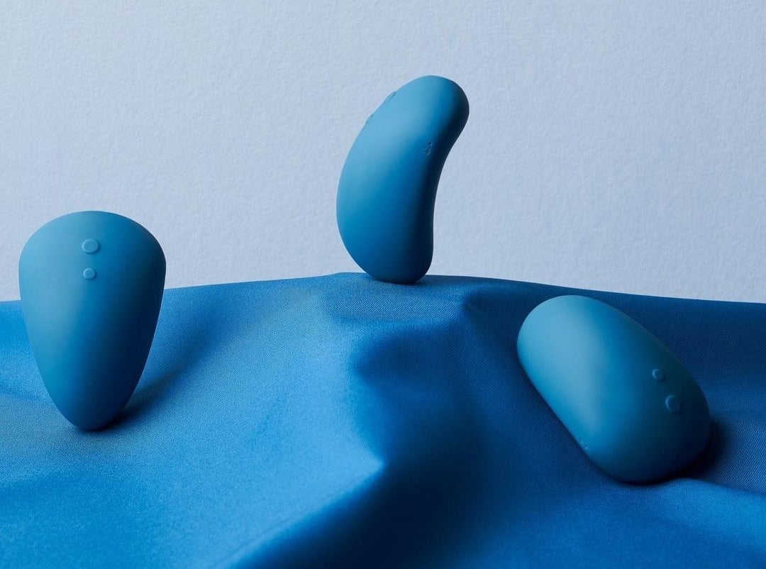 Blue vibrator displayed at different angles