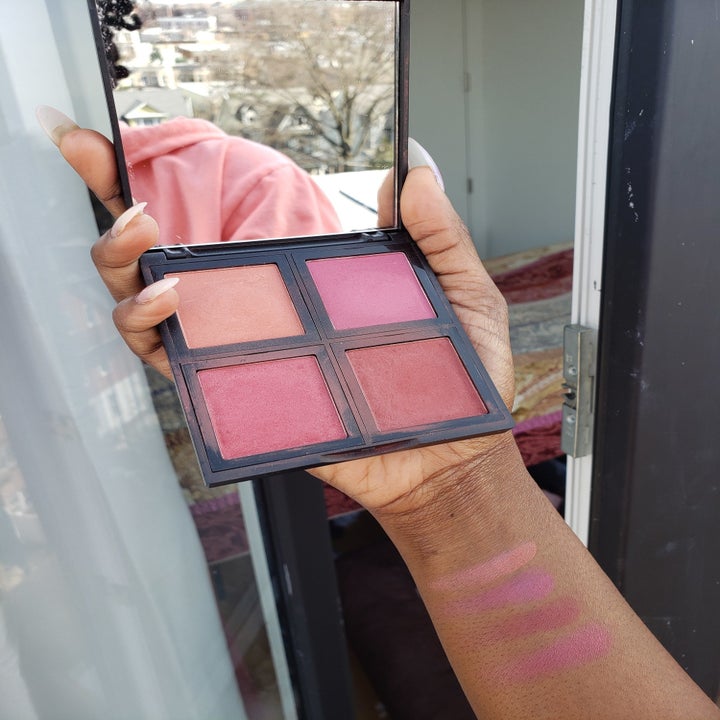 buzzfeed editor holding the palette of four colors