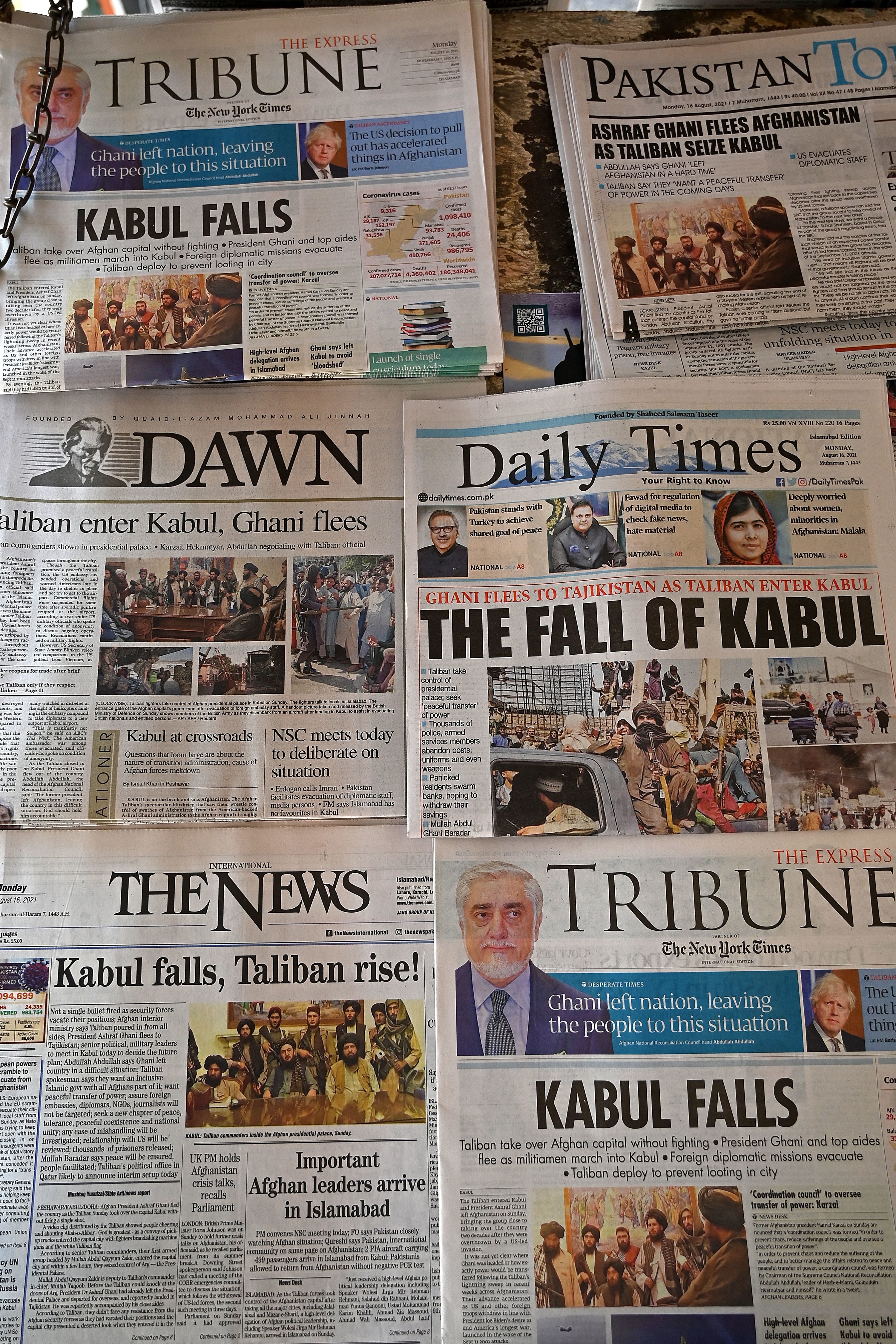 Pakistan&#x27;s newspapers are pictured displaying front page news about Afghanistan, at a stall in Islamabad