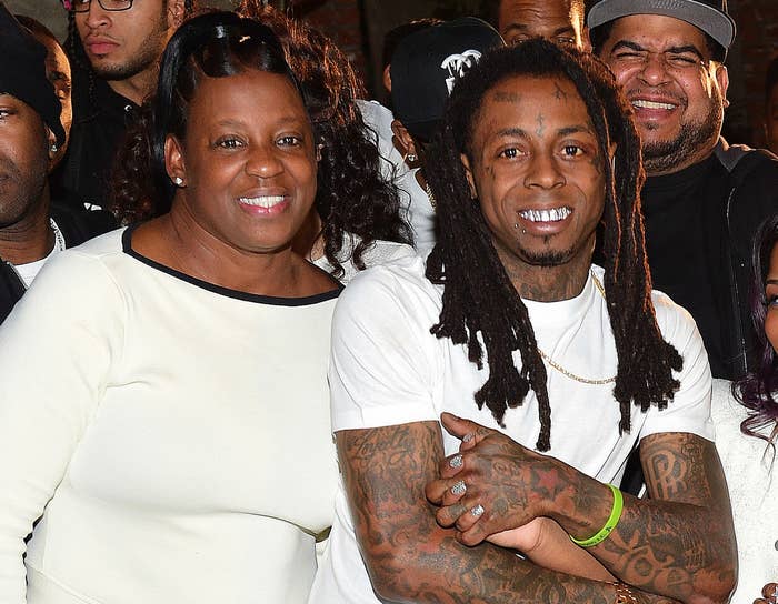 Wayne poses with his mother at an event