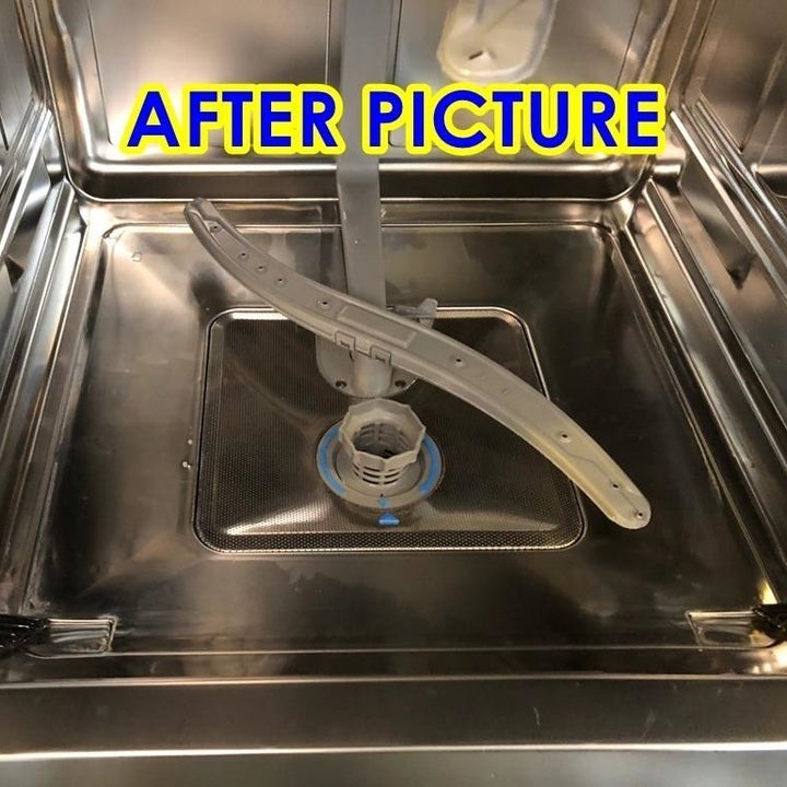 a reviewer image of the same dishwasher labeled "after picture" looking clean 