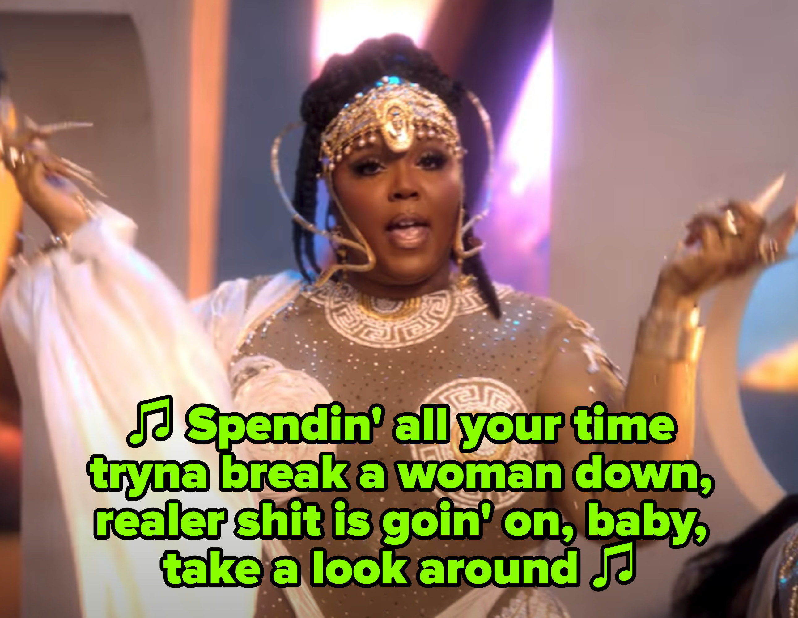 Lizzo in her &quot;Rumors&quot; music video singing: &quot;Spendin&#x27; all your time tryna break a woman down, realer shit is goin&#x27; on, baby, take a look around&quot;