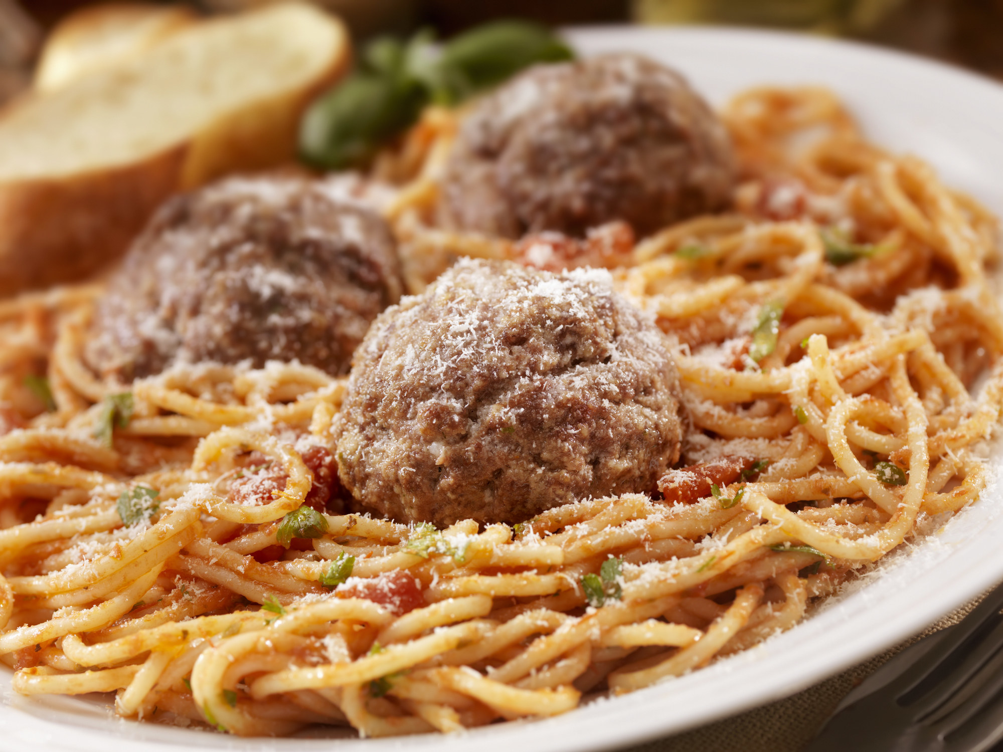 A big plate of spaghetti and meatballs.