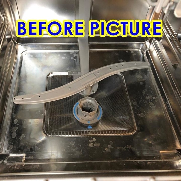 a reviewer pictures labeled "before picture" of the interior of a dishwasher with hard 
