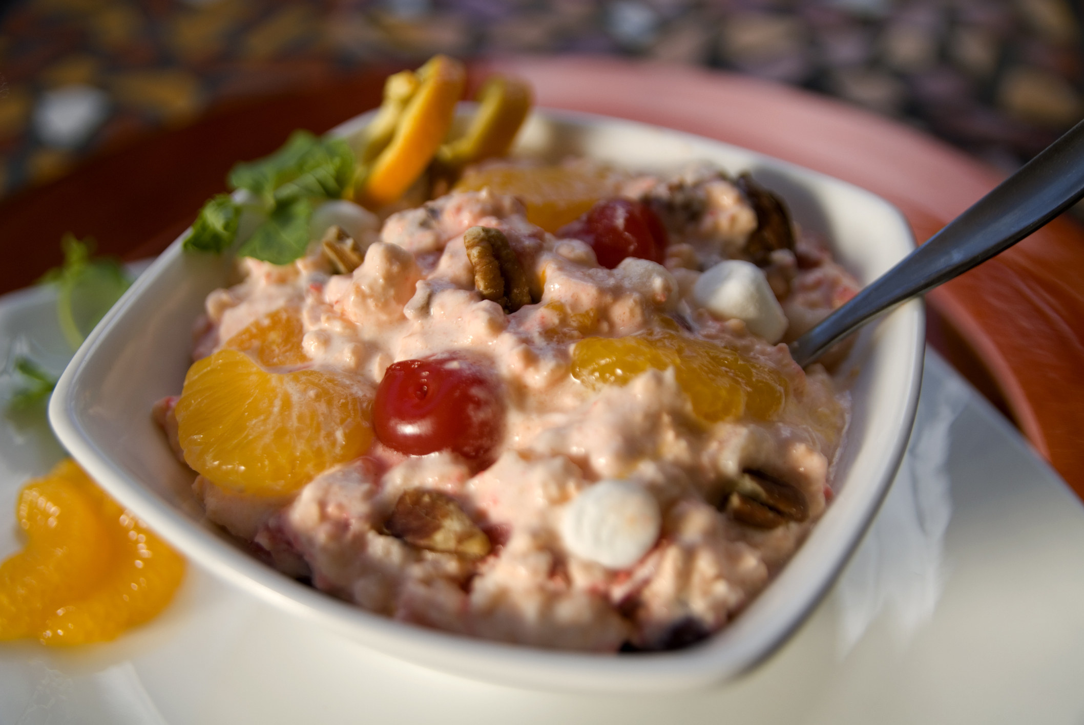 Jello salad with fruit.