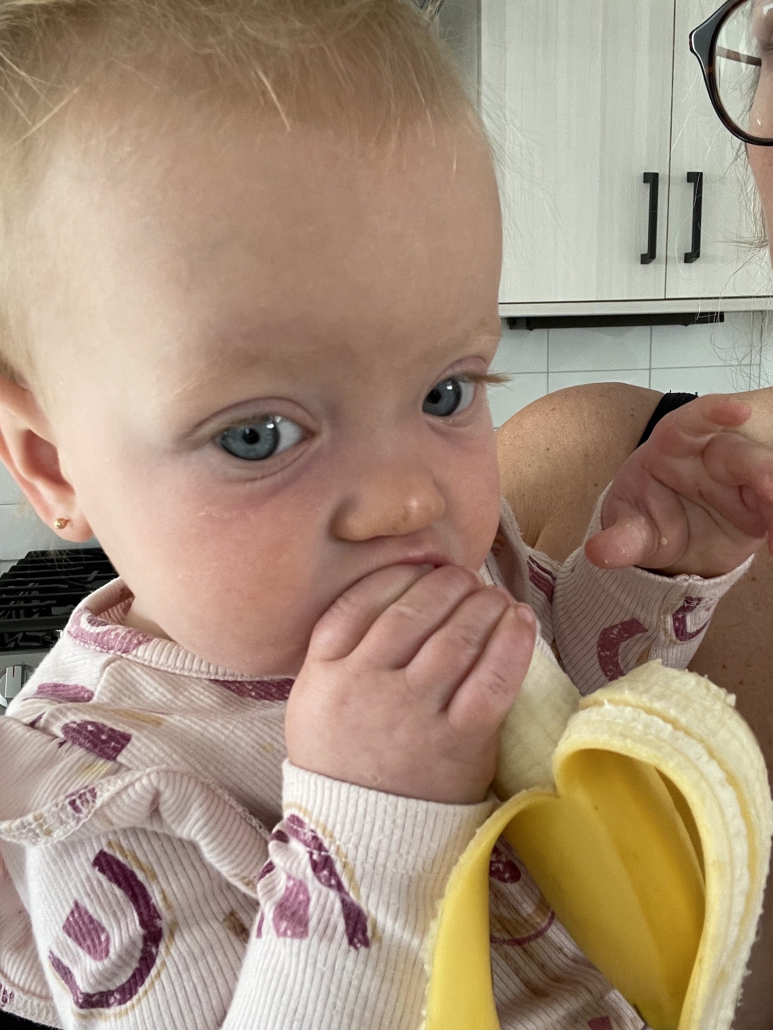 The author&#x27;s kid eating a banana