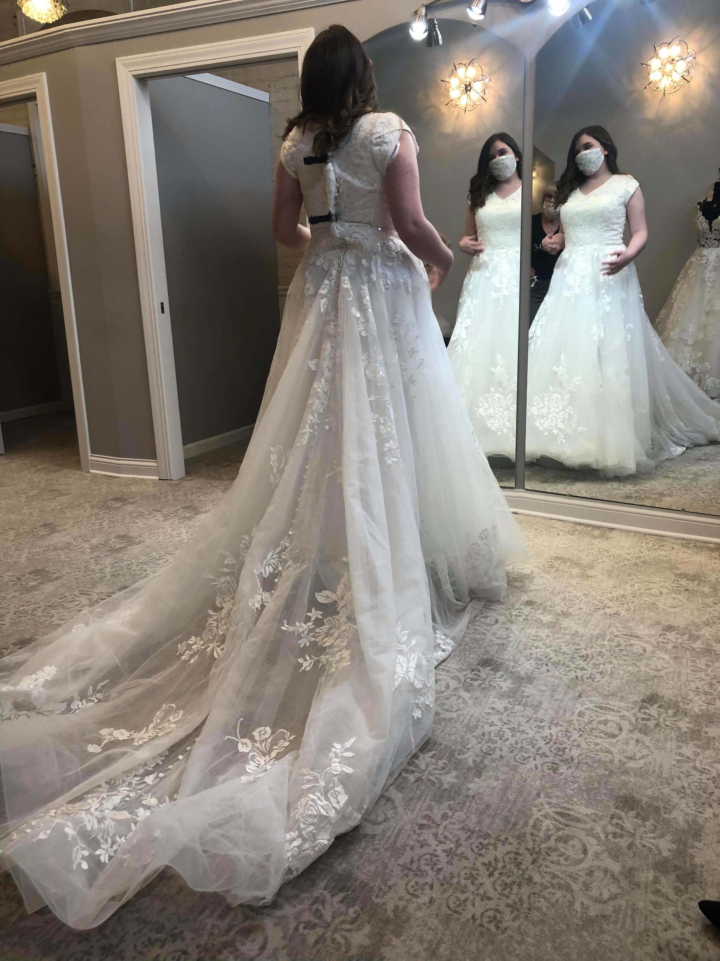 An image of the author trying on a wedding dress