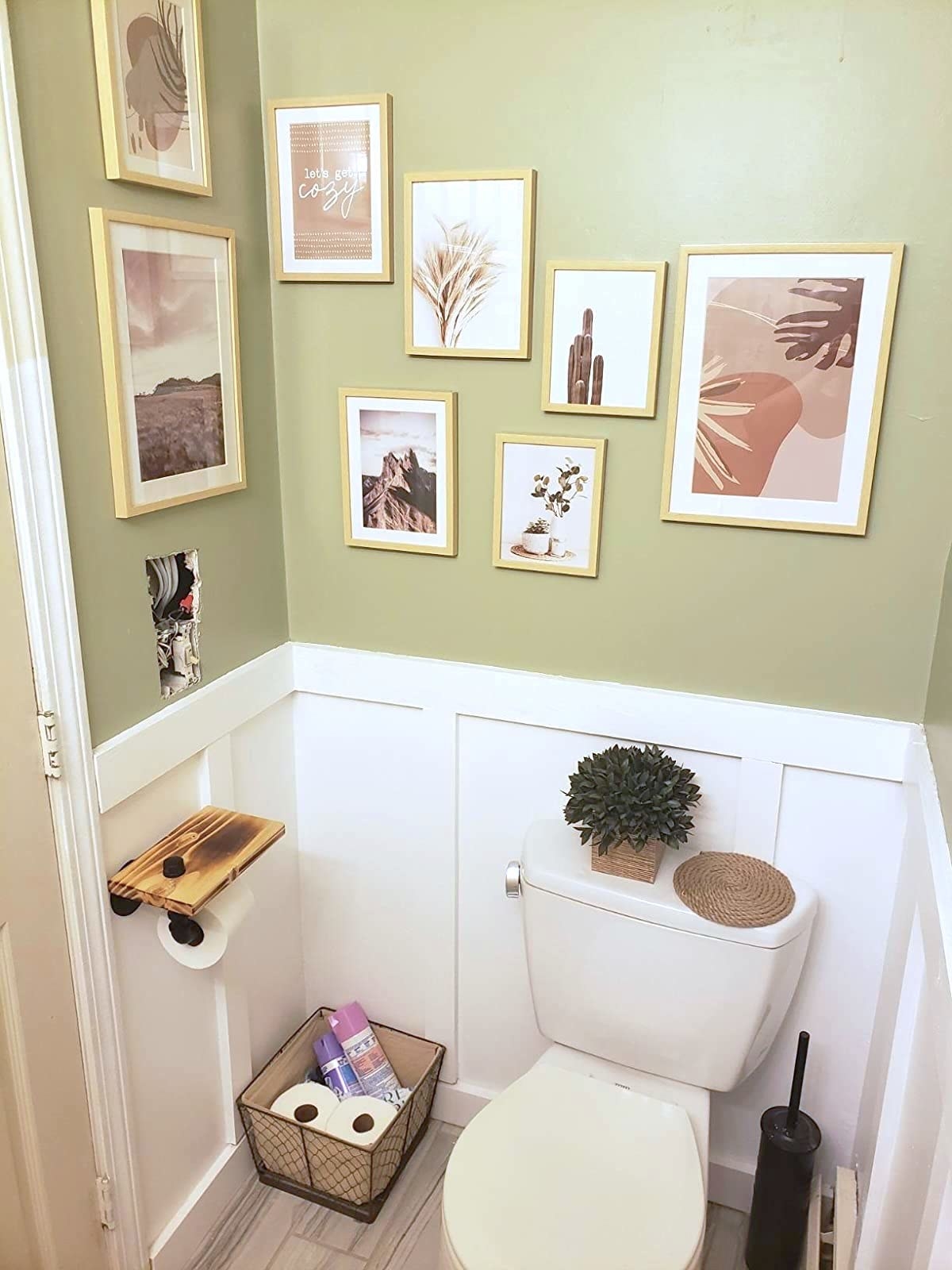 Reviewer&#x27;s bathroom with the art set on the wall