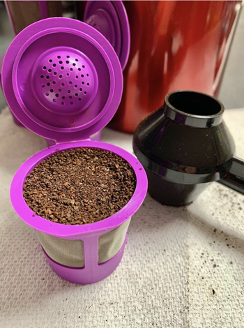 Reviewer image of the Keurig pod full of coffee grinds close up 