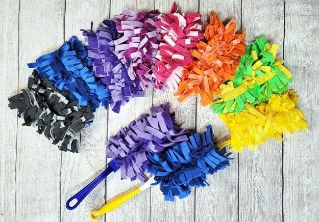 Cut up fleece fabric swiffer heads in different color combinations