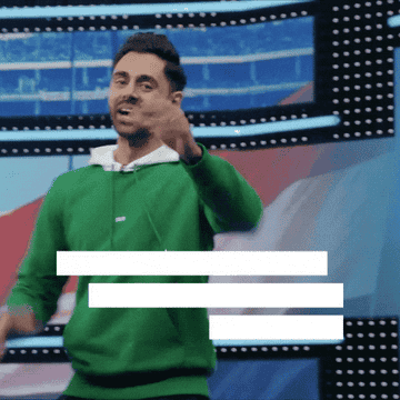 Hasan Minhaj pointing with two fingers, saying, &quot;Let&#x27;s break this down&quot;
