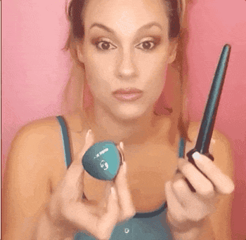 a gif of someone using the applicator tool to apply eyeliner 