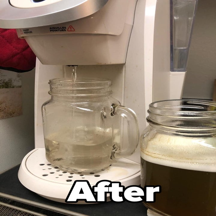 a reviewer photo of a Keurig dispensing clear water into a cup and text reading "after" 