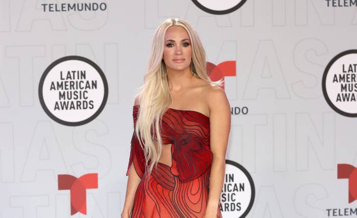 Carrie Underwood is pictured wearing red at the Latin American Music Awards