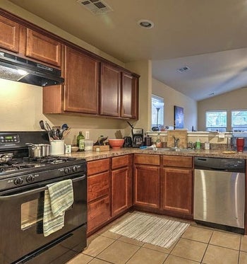 reviewer kitchen with dated cabinets