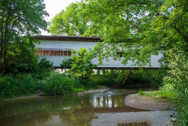 A blue covered bridge in Parke, County.