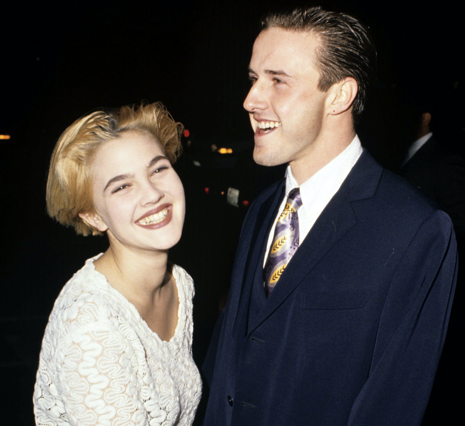 Drew Barrymore and David Arquette laughing together