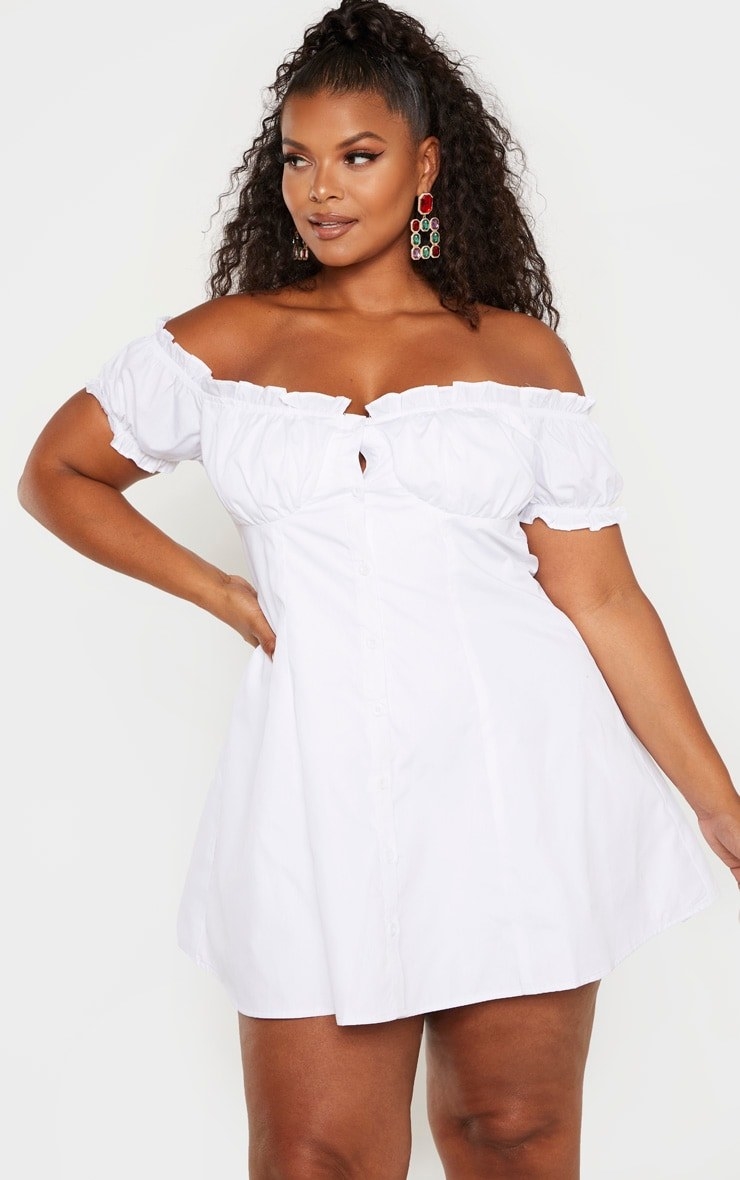 Model wearing white dress