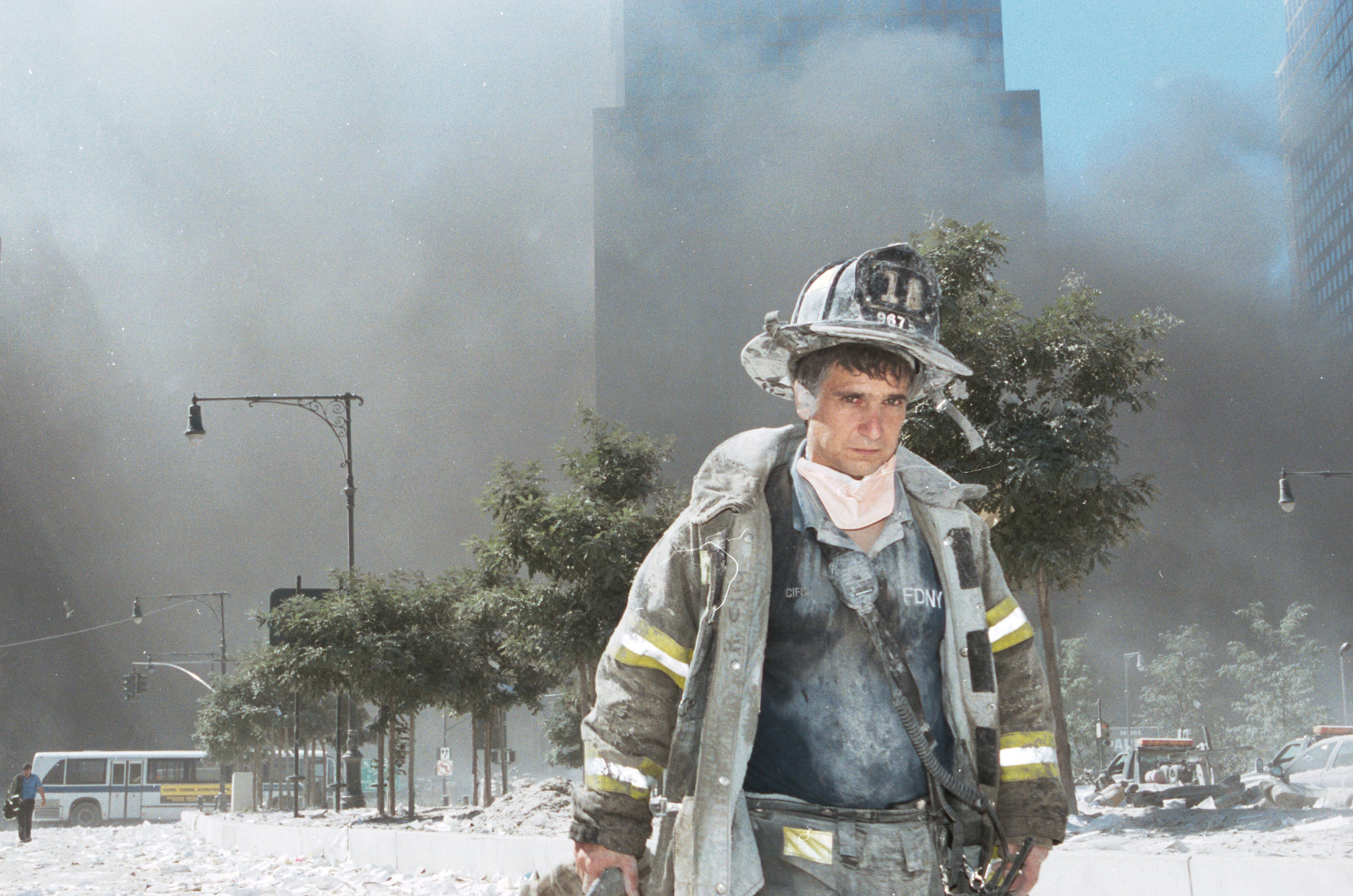 Firefighter stands among the debris of the fallen towers in New York City