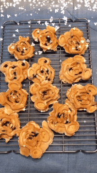 a gif of a plate full of mickey waffles made by the editor
