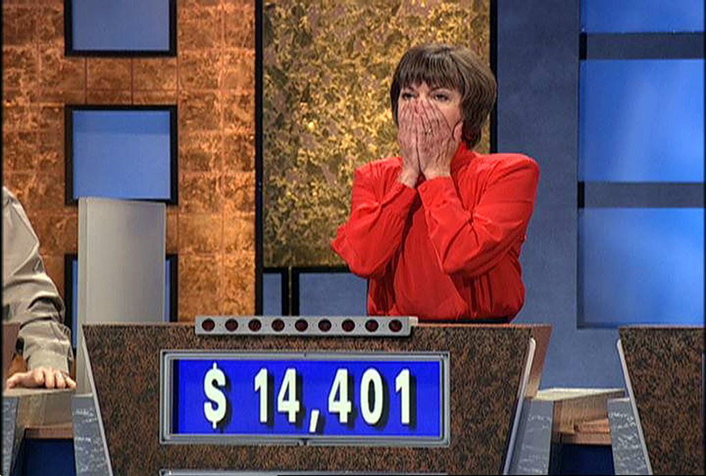 A contestant reacts after winning a game of Jeopardy
