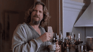 The Dude stirs his White Russian