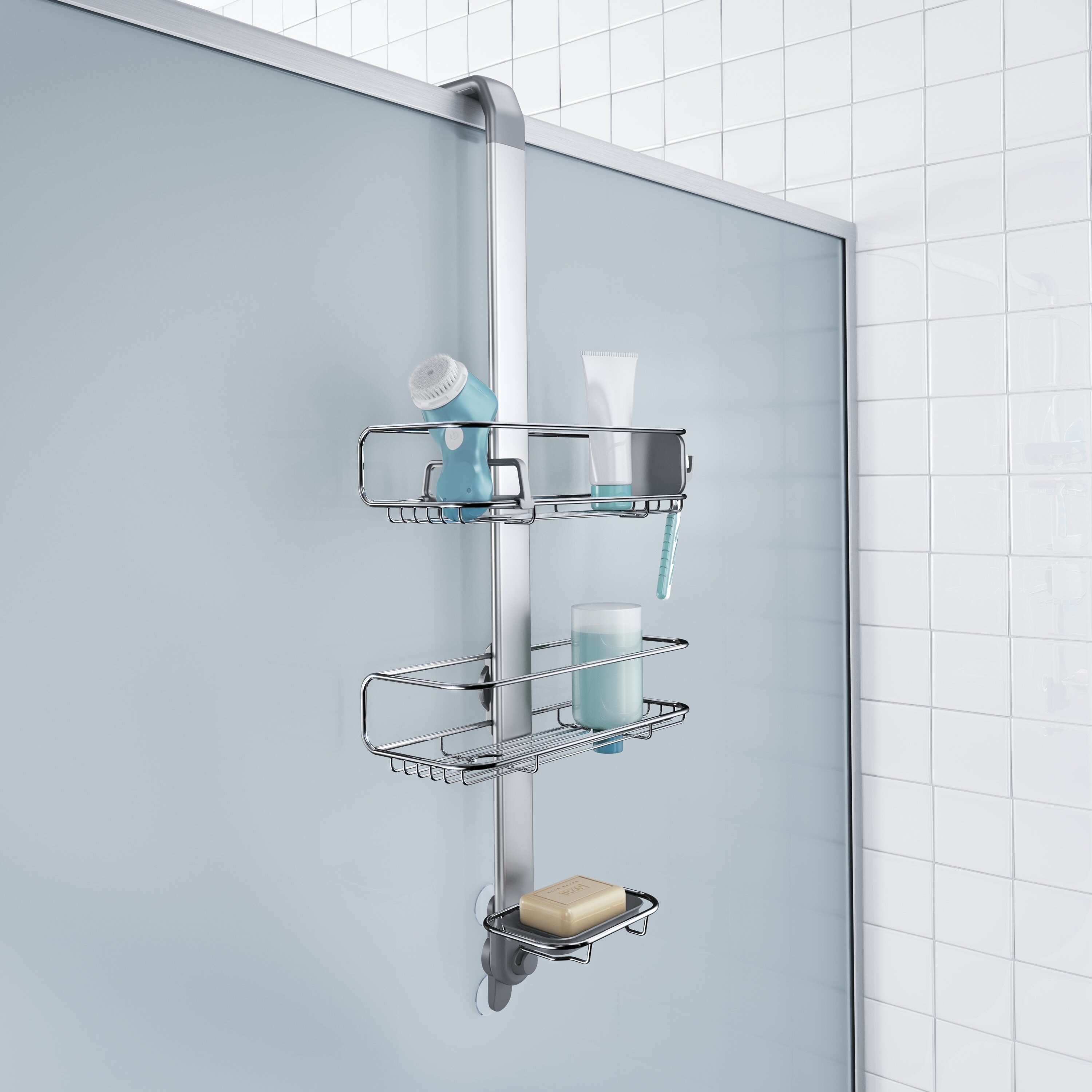 A metallic contraption that hangs over the side of the shower with shelving for soap and shampoo