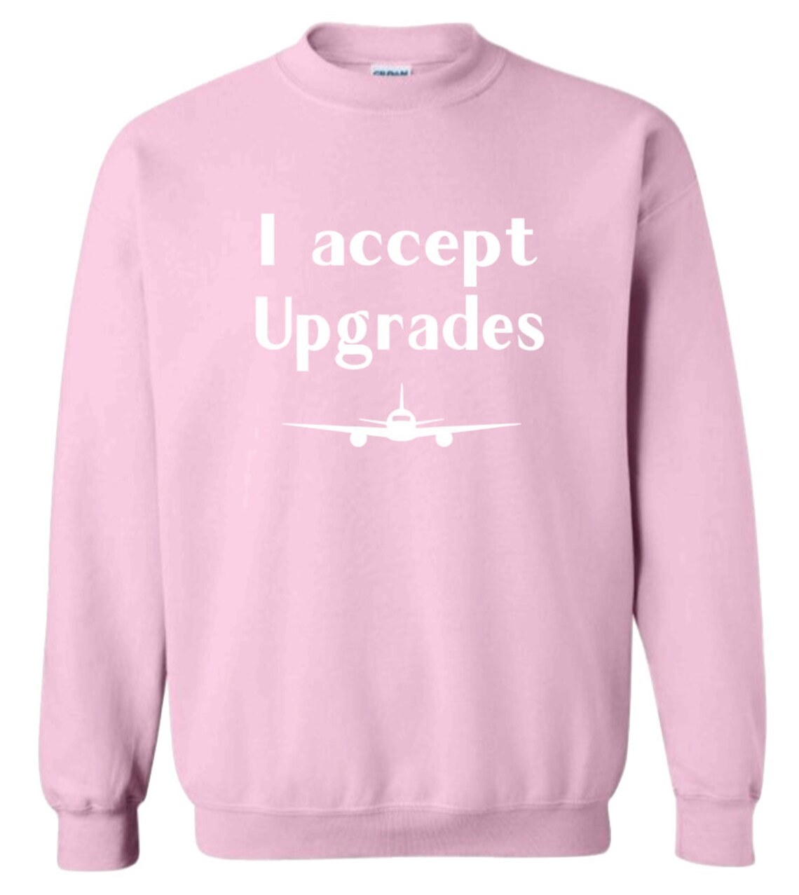 The sweatshirt in pink that reads, &quot;I accept upgrades&quot;