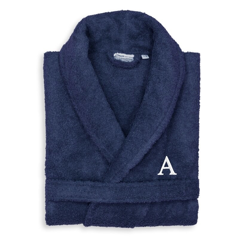 A navy blue robe with a white J embroidered on it