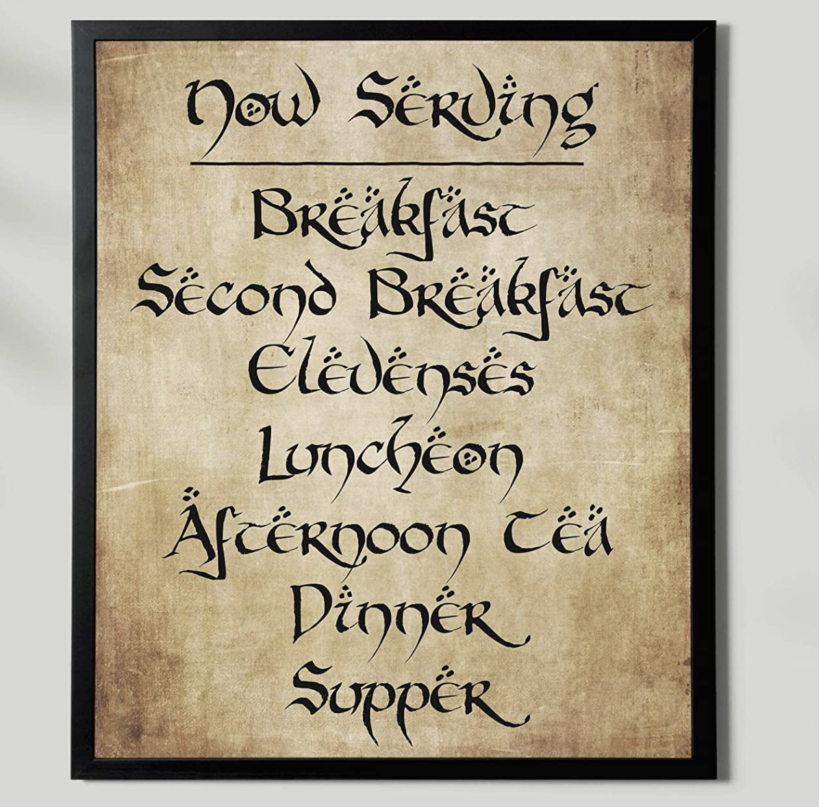 Sign that lists all seven hobbit meals in old time-y font