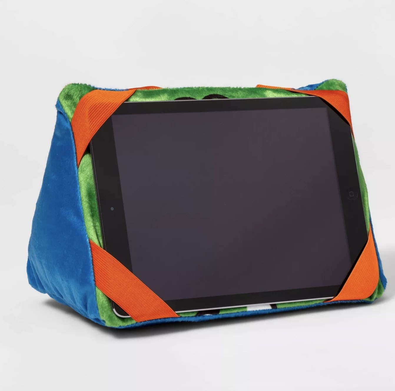 the pillow with an Ipad propped in it
