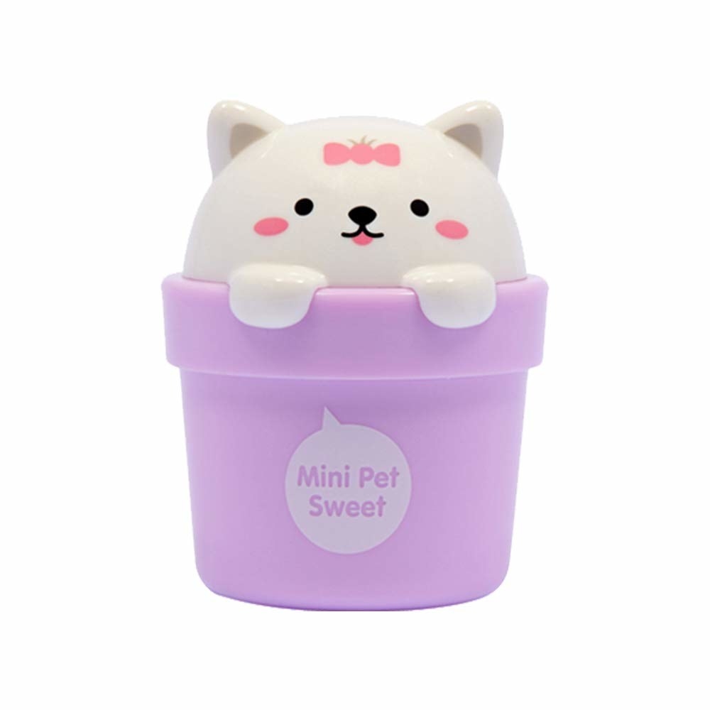 A flower pot shaped container with a cat figurine peeping out