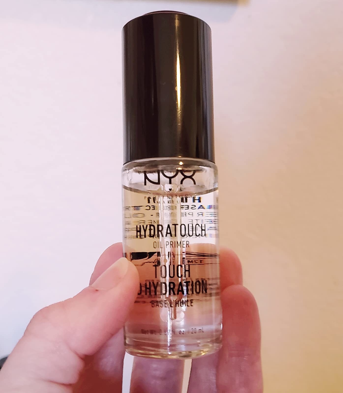 image of the NYX hydrating primer in a reviewer&#x27;s hand