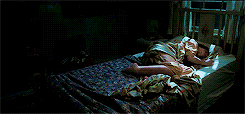 GIF of restless person in bed trying to sleep