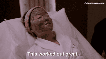 person wearing a face mask saying &quot;this worked out great&quot;