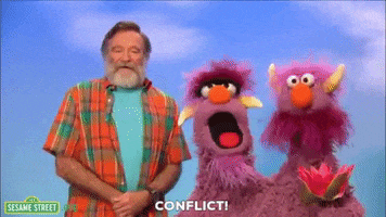 Robin Williams and Sesame Street puppets saying &quot;conflict!&quot; and dancing