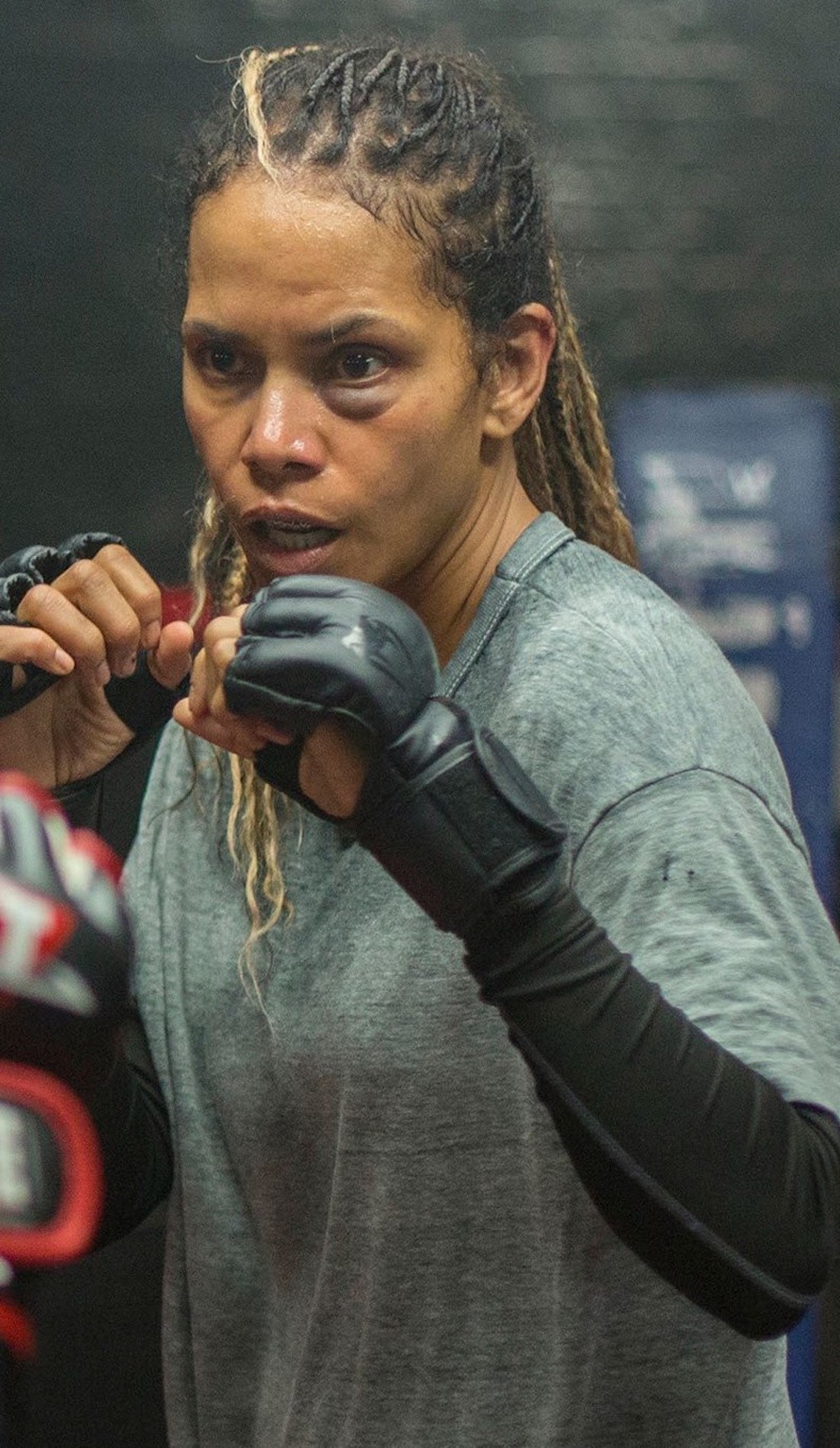 Halle Berry as a boxer in the ring with her eye bruised