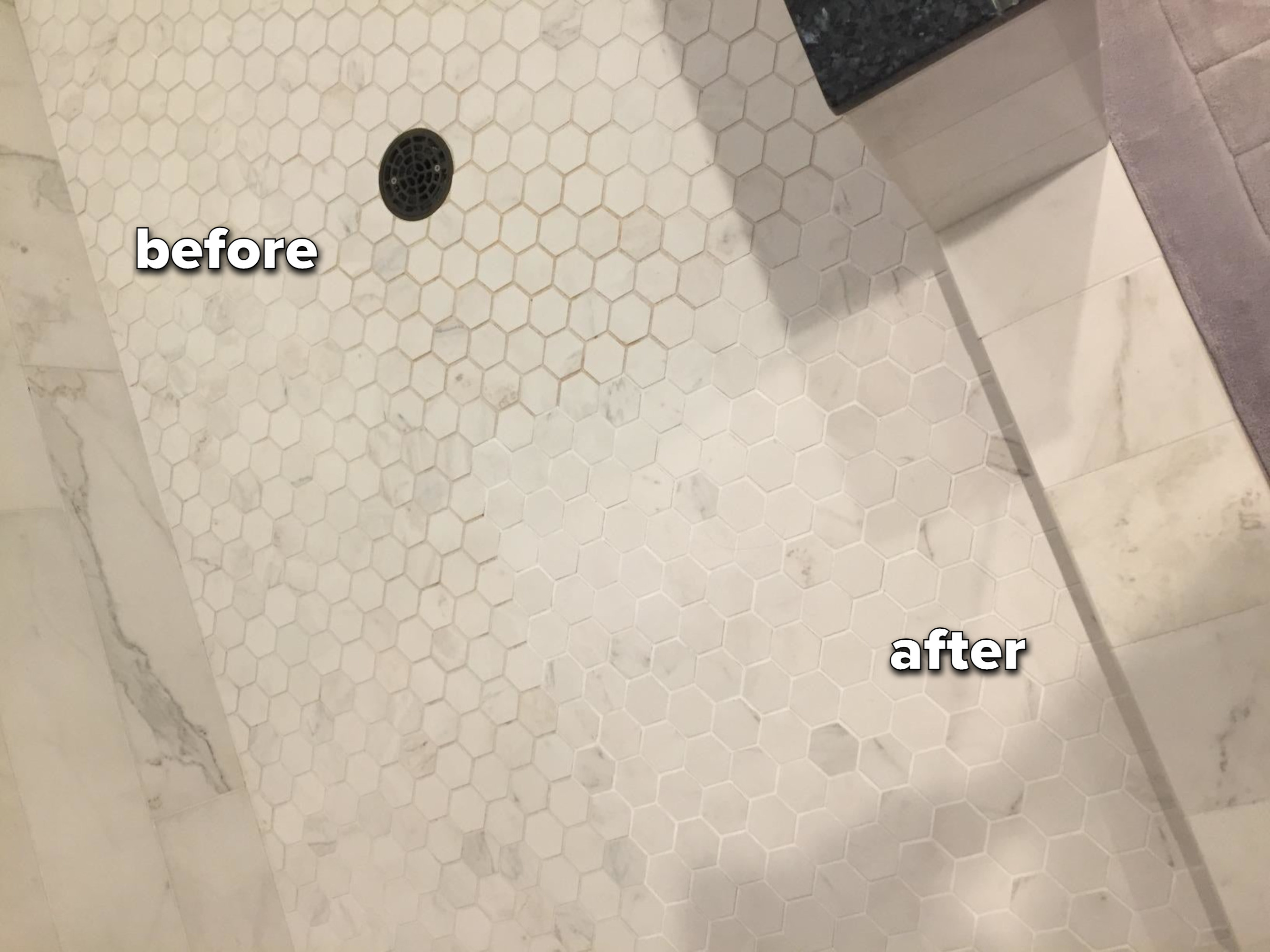 reviewer&#x27;s bathroom tiles showing white grout next to unpainted, brown grout