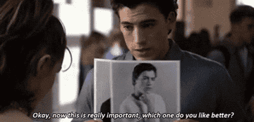 andrew keegan holds up two pics of himself